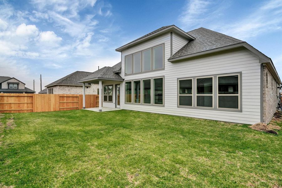 Exterior details and patio area of a home in Canterra Creek  60', Iowa Colony (Image 29).