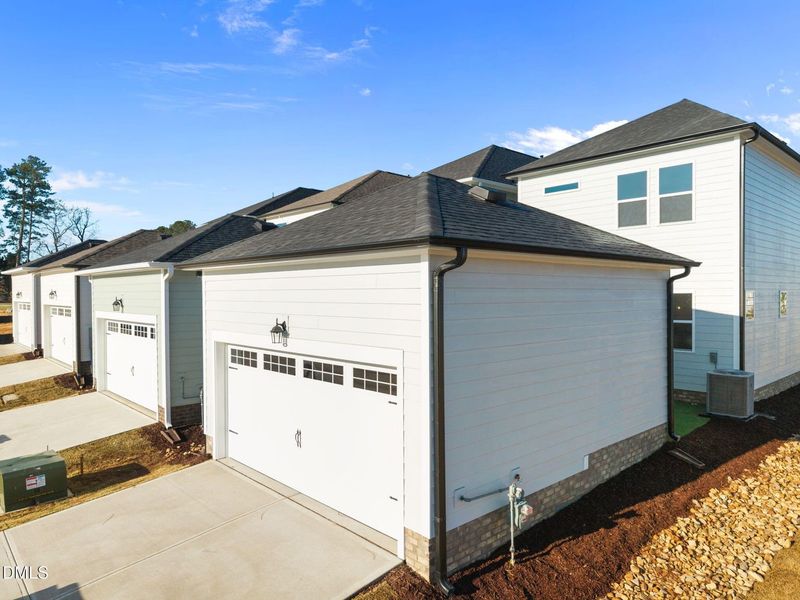 Exterior details and patio area of a home in Forestville Yard, Knightdale (Image 20).