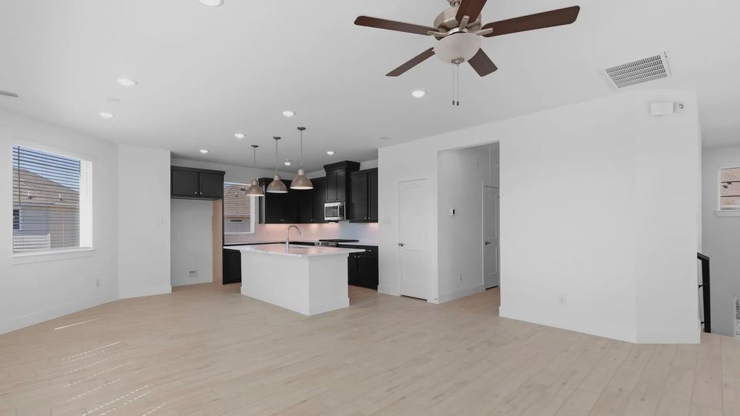 Representative furnished interior of a home built from the Oakdale by Chesmar Homes in Bridgeland Courtyard, Cypress (Image 10).