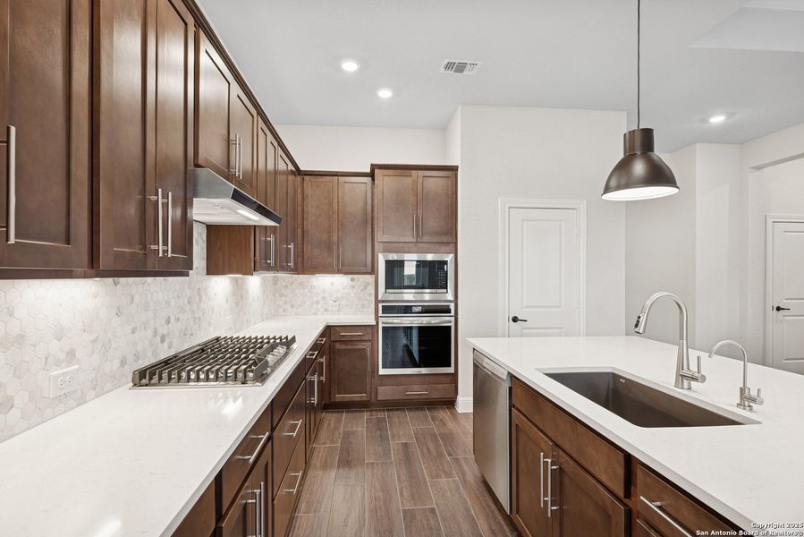 Furnished interior view inside a new home in Windsong - Reserve Series, Boerne (Image 7). Furnished interior view inside a new home in Windsong - Reserve Series, Boerne (Image 7).