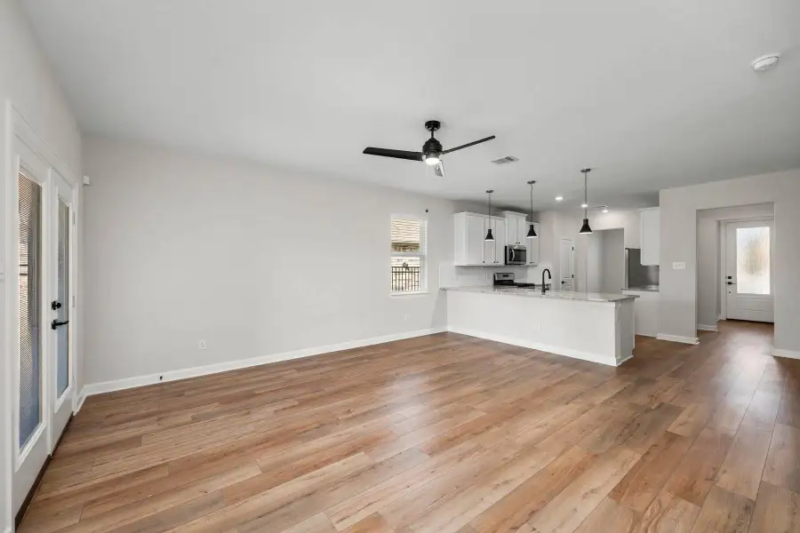 Spacious, unfurnished interior of a new home in Sunterra, Katy (Image 7). Spacious, unfurnished interior of a new home in Sunterra, Katy (Image 7).