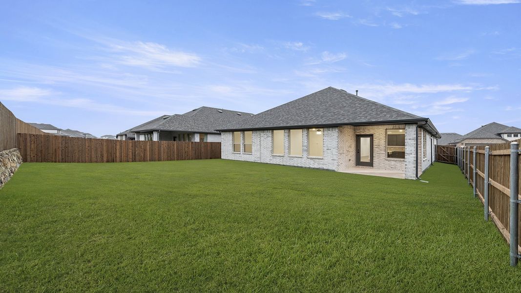 Exterior details and patio area of a home in The Oaks, Red Oak (Image 21). Exterior details and patio area of a home in The Oaks, Red Oak (Image 21).