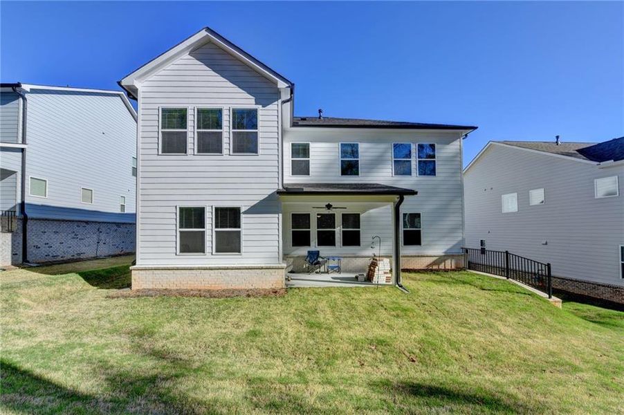 Exterior details and patio area of a home in Bailey Fence, Dacula (Image 3).