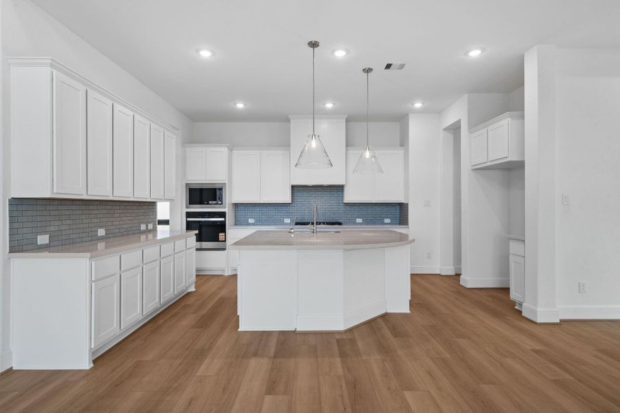 Furnished interior view inside a new home in Dunham Pointe 70', Cypress (Image 6).