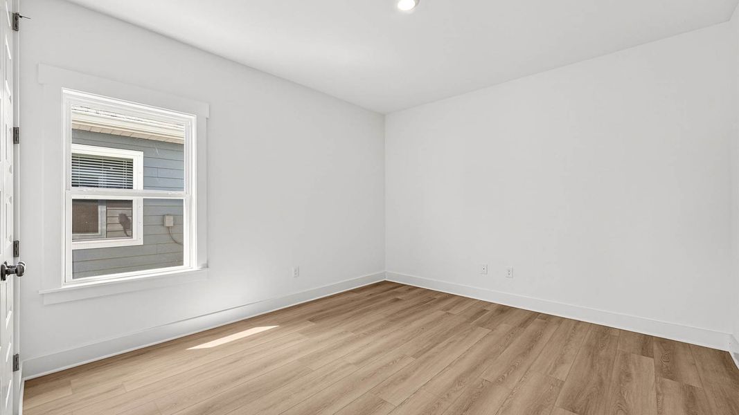 Representative unfurnished interior of a home built from the The Lily by D.R. Horton in WindMark Beach, Port Saint Joe (Image 31).