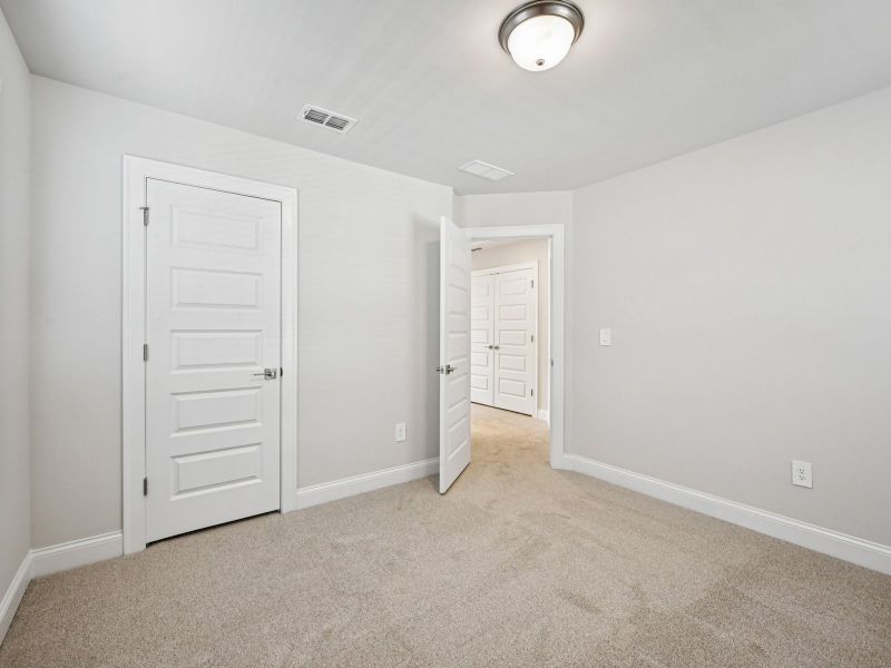 Spacious, unfurnished interior of a new home in Hemingway - Highland Series, Cumming (Image 17).
