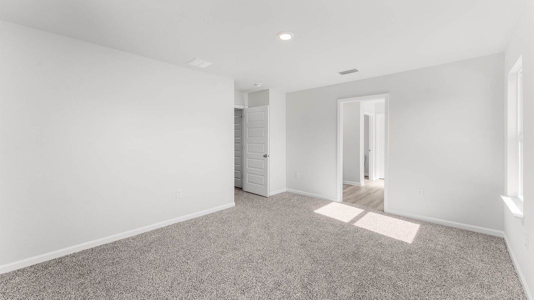 Representative unfurnished interior of a home built from the The Aisle by D.R. Horton in Chateau Nemours, Port Saint Joe (Image 27).