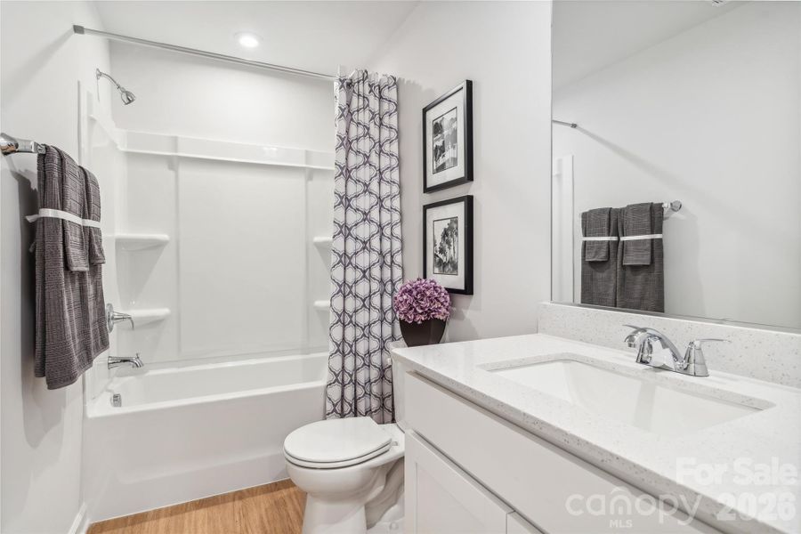 Example Photo Example Photo