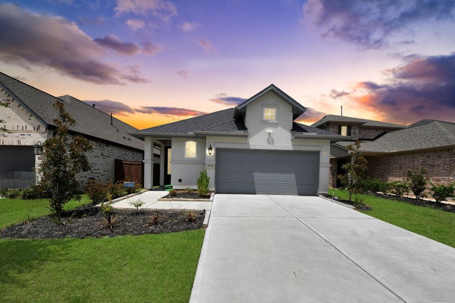 Front exterior of a new home in , Conroe, TX, highlighting curb appeal (Image 26).