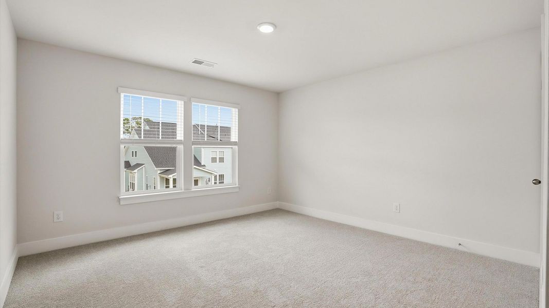 Furnished interior view inside a new home in Village at Midway, Anderson (Image 29).