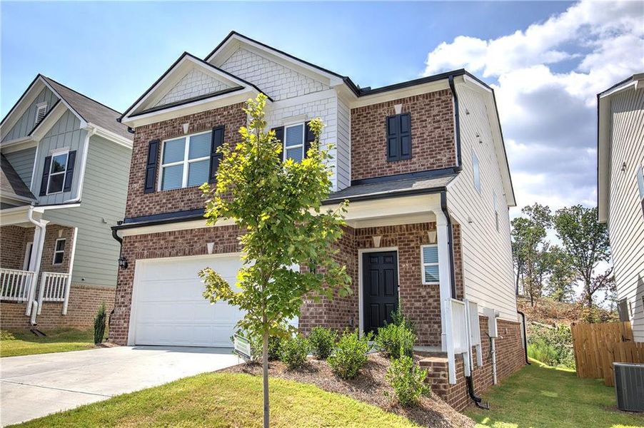 Front exterior of a new home in , Cartersville, GA, highlighting curb appeal (Image 27).