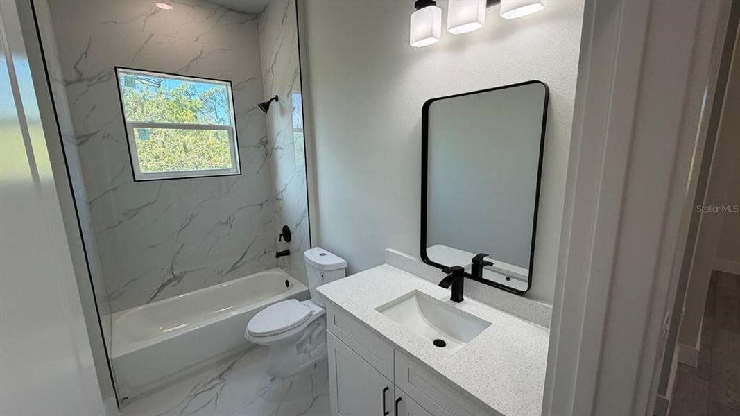 Furnished interior view inside a new home in , Port Charlotte (Image 13).