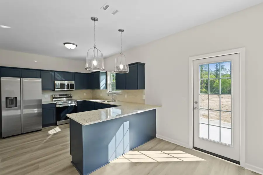 Representative furnished interior of a home built from the The Anderson by RTS Homes in The Pointe at Villages on Marne, Hinesville (Image 7).