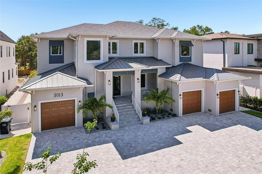Front exterior of a new home in , Tampa, FL, highlighting curb appeal (Image 28).