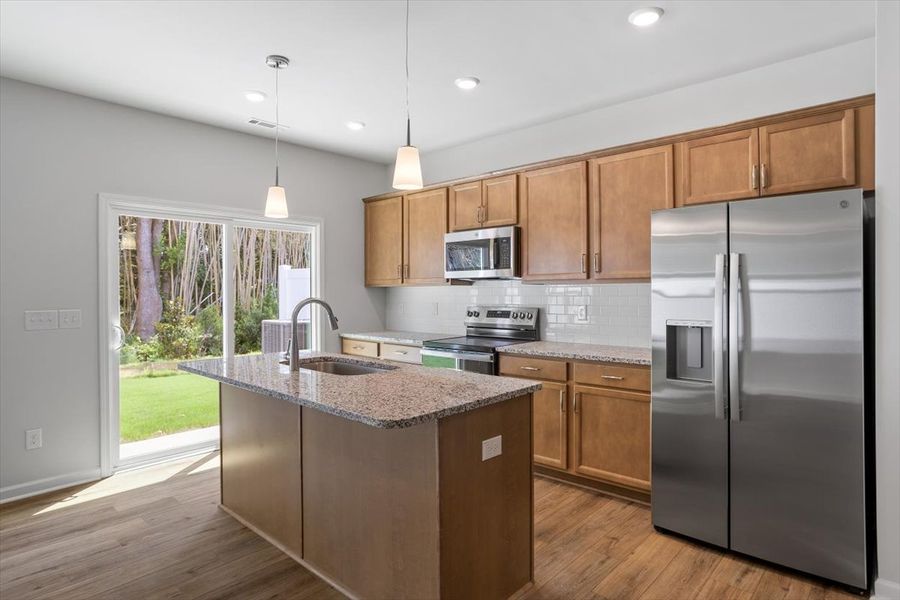 Furnished interior view inside a new home in West Main Townhomes, Sanford (Image 8).