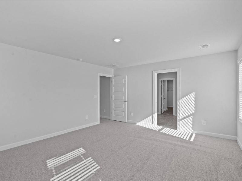 Spacious, unfurnished interior of a new home in The Farm at Wells Creek - Signature Collection, Gray Court (Image 15).