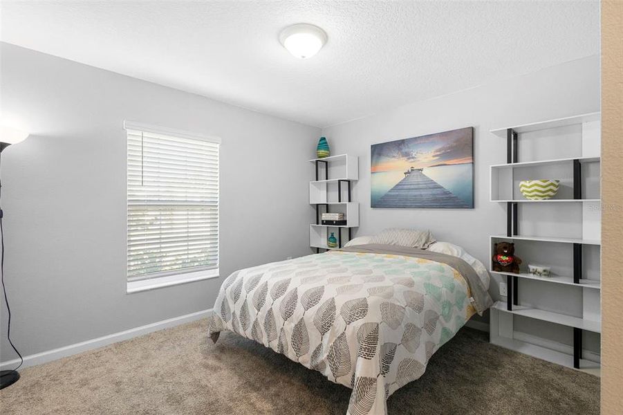 Furnished interior view inside a new home in Vineland Reserve, Osteen (Image 17).