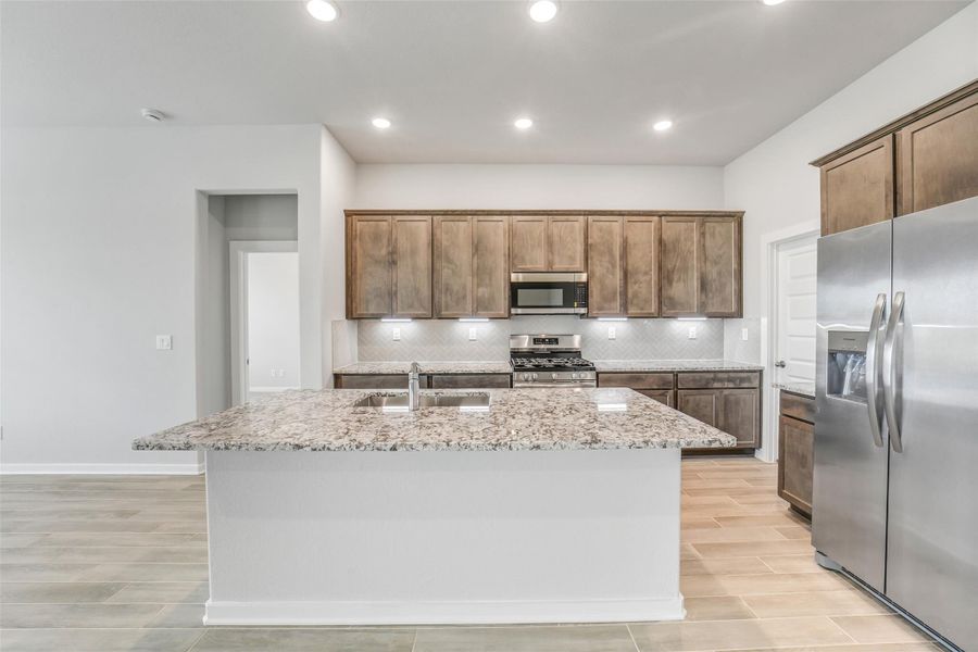 Furnished interior view inside a new home in Windmill Estates, Magnolia (Image 11).