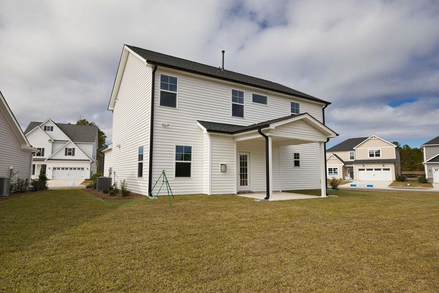 Representative exterior photo of a completed home built from the Meadowbrook by Caviness & Cates Communities in Sutherland Station at Olde Liberty, Franklinton, NC (Image 223). Representative exterior photo of a completed home built from the Meadowbrook by Caviness & Cates Communities in Sutherland Station at Olde Liberty, Franklinton, NC (Image 223).