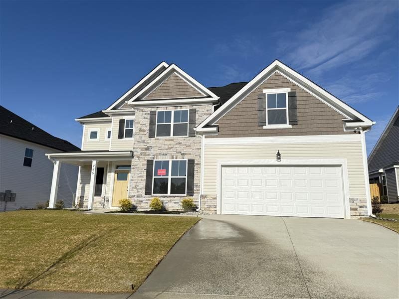 Front exterior of a new home in Windsor, North Augusta, SC, highlighting curb appeal (Image 18). Front exterior of a new home in Windsor, North Augusta, SC, highlighting curb appeal (Image 18).