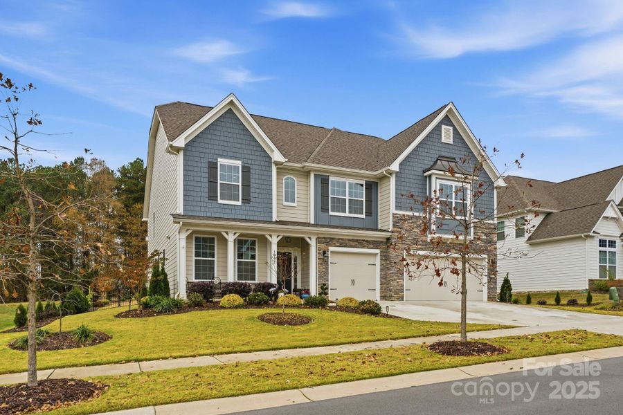 Front exterior of a new home in , Huntersville, NC, highlighting curb appeal (Image 1). Front exterior of a new home in , Huntersville, NC, highlighting curb appeal (Image 1).