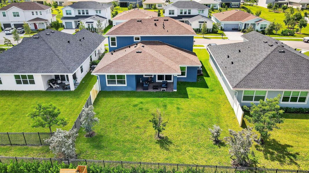 Front exterior of a new home in , Loxahatchee, FL, highlighting curb appeal (Image 22).