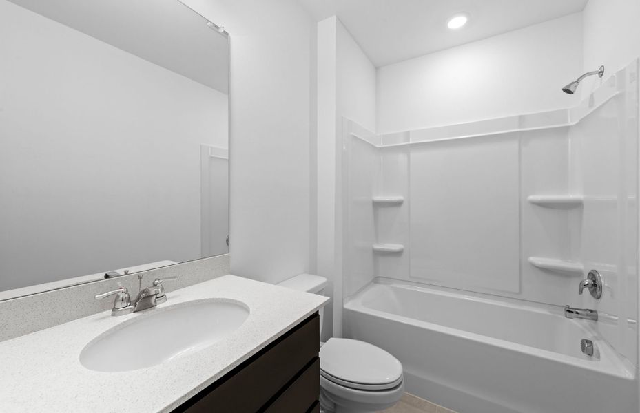 Furnished interior view inside a new home in Caloosa Cove, Labelle (Image 6).