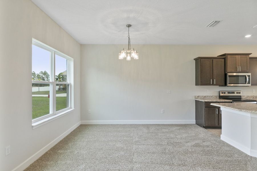 Representative unfurnished interior of a home built from the 2705 by Adams Homes in Winding Oaks, Weeki Wachee (Image 15).