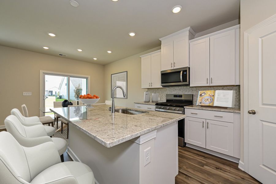 Furnished interior view inside a new home in Harper Landing, Stanley (Image 5).