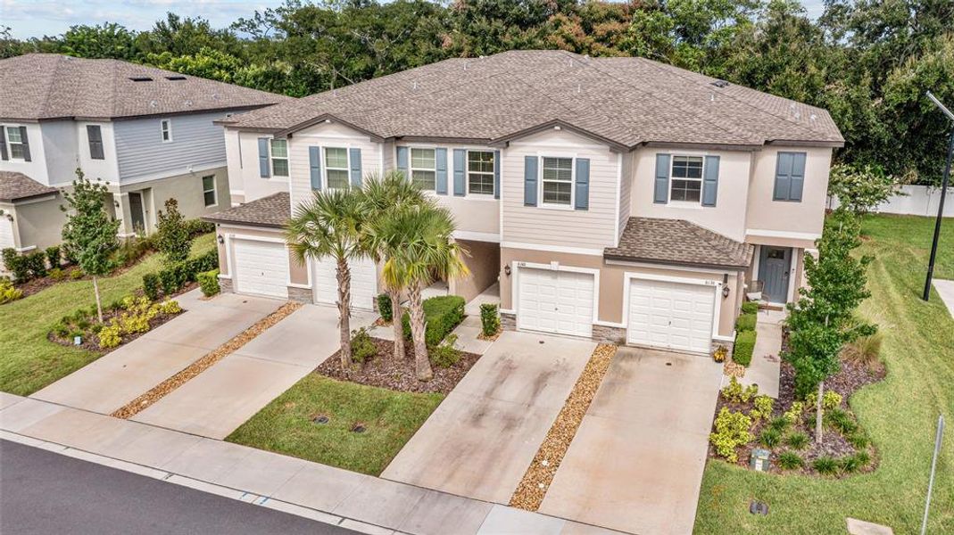 Front exterior of a new home in , Land O' Lakes, FL, highlighting curb appeal (Image 1). Front exterior of a new home in , Land O' Lakes, FL, highlighting curb appeal (Image 1).