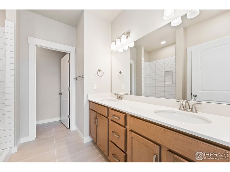 Furnished interior view inside a new home in The Lakes at Centerra - Discovery, Loveland (Image 13).