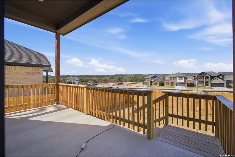 Exterior details and patio area of a home in The Woodlands at Medina Hills, Mico (Image 21).