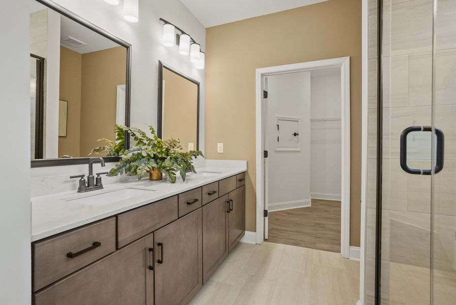 Owner's Bath with Dual Bowl Vanity and Walk-In Shower