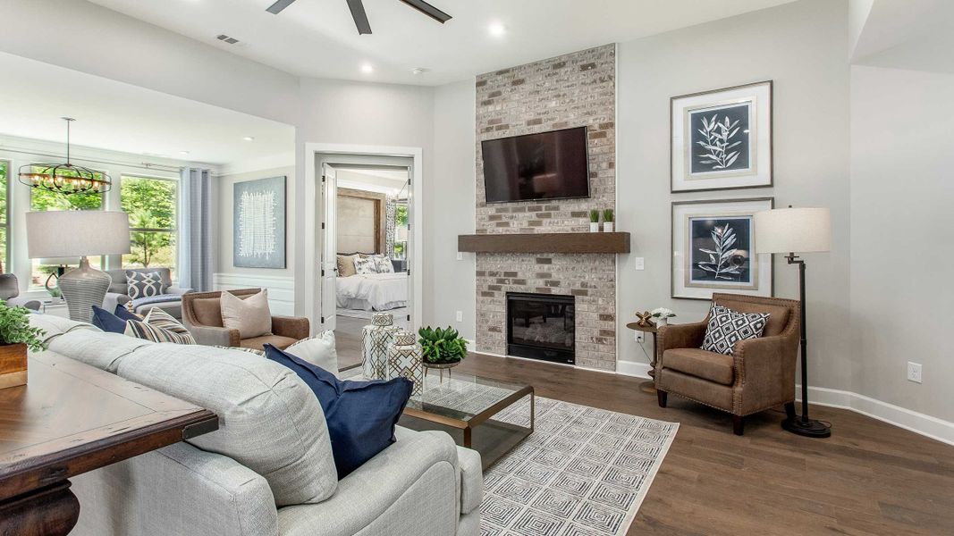 Great Room - Hickory Model Shown from sister Community