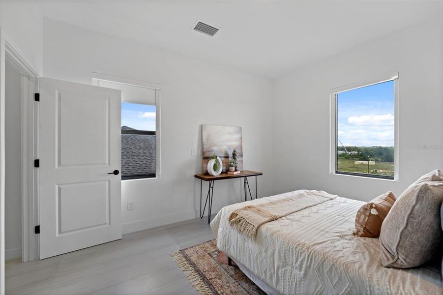 Furnished interior view inside a new home in On Villa Pass, Mascotte (Image 13). Furnished interior view inside a new home in On Villa Pass, Mascotte (Image 13).