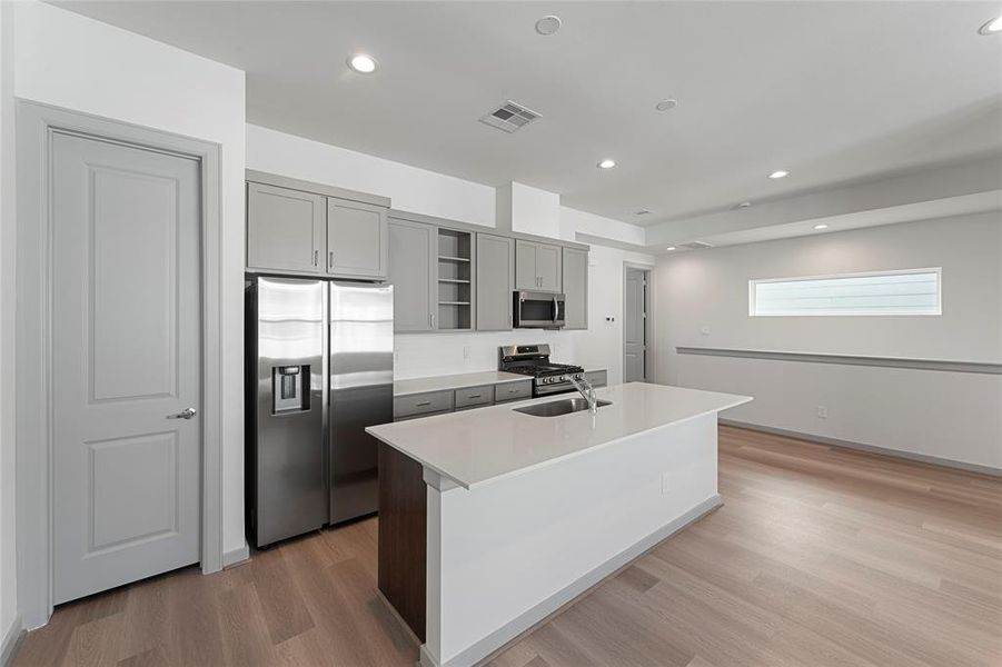 2nd Floor - Kitchen open to Living Room.