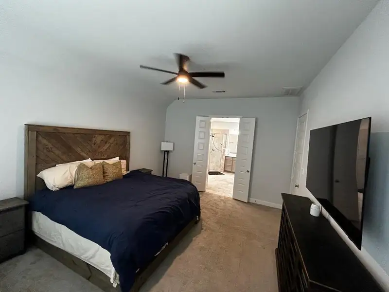 Furnished interior view inside a new home in Grand Central Park 45', Conroe (Image 8).