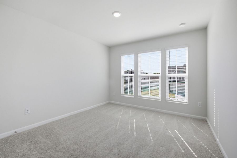 Spacious, unfurnished interior of a new home in Carpenter Falls, Durham (Image 28).