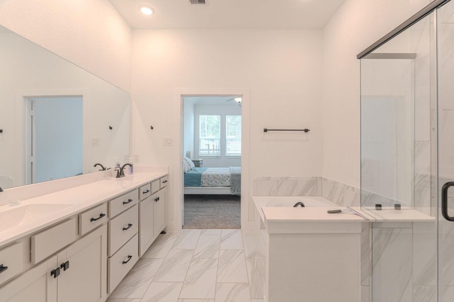 Furnished interior view inside a new home in The Woodlands Hills, Willis (Image 13).