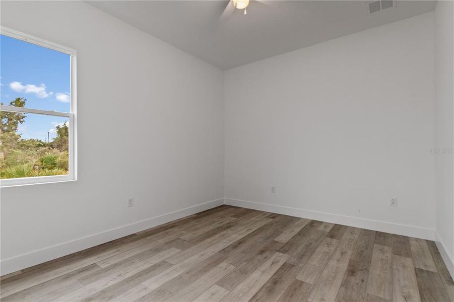 Spacious, unfurnished interior of a new home in , Port Charlotte (Image 33).