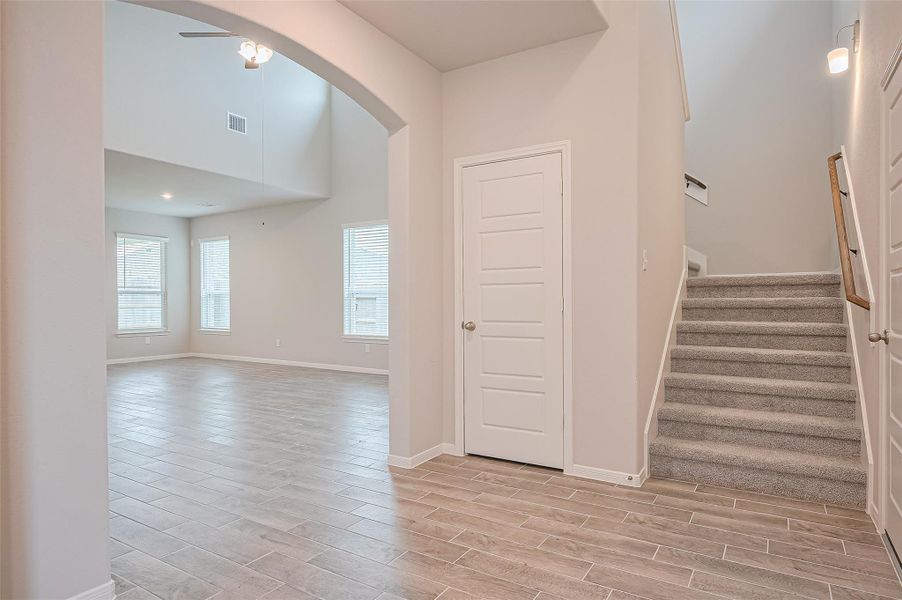 Spacious, unfurnished interior of a new home in Sunterra, Katy (Image 36).