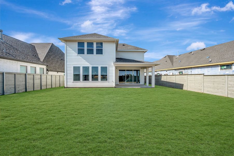 Exterior details and patio area of a home in Landmark, Denton (Image 15).