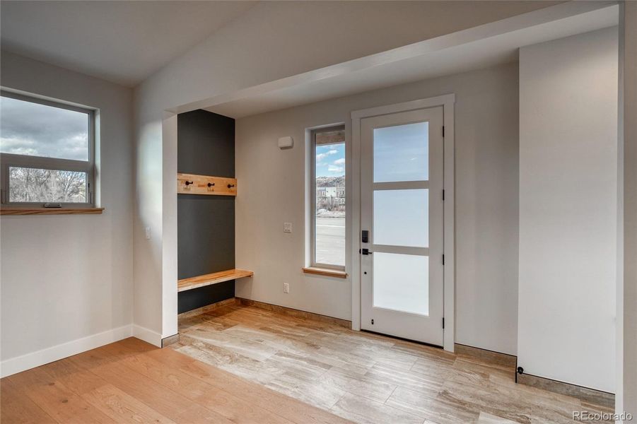Foyer with coat rack and bench