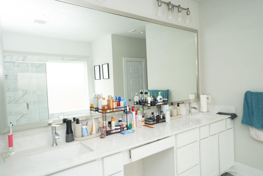 Furnished interior view inside a new home in Sunterra, Katy (Image 17).