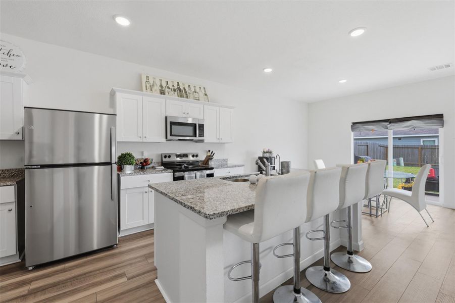 Photo has been digitally enhanced for lighting, color, and presentation purposes while maintaining the true condition and character of the home. Photo has been digitally enhanced for lighting, color, and presentation purposes while maintaining the true condition and character of the home.