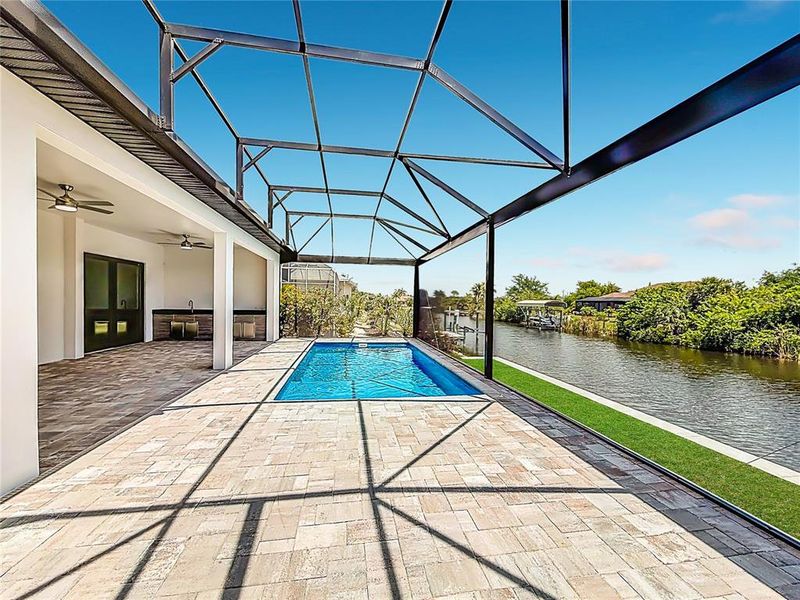 Exterior details and patio area of a home in , Port Charlotte (Image 24).