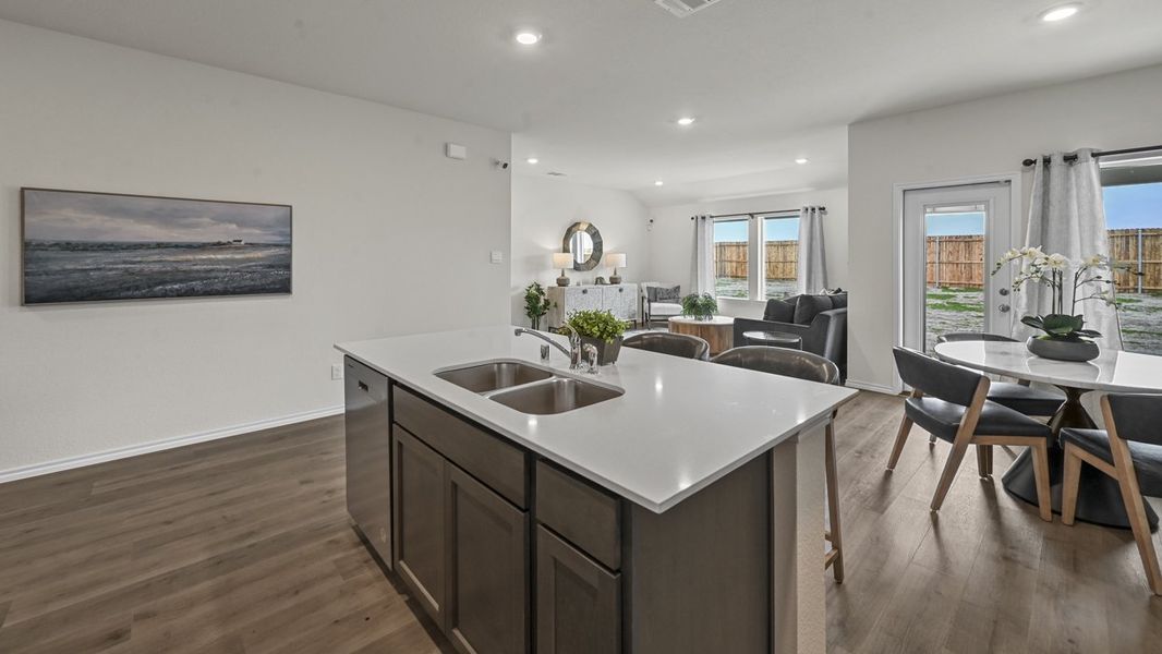Representative furnished interior of a home built from the Texas Cali by D.R. Horton in Whitewing Trails, Princeton (Image 11).