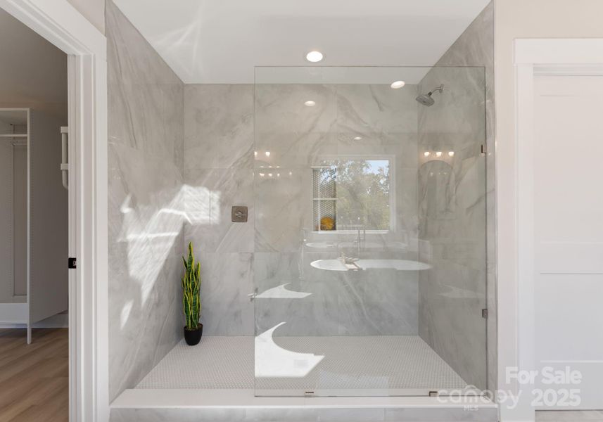 Floor to Ceiling Tile in Primary Shower