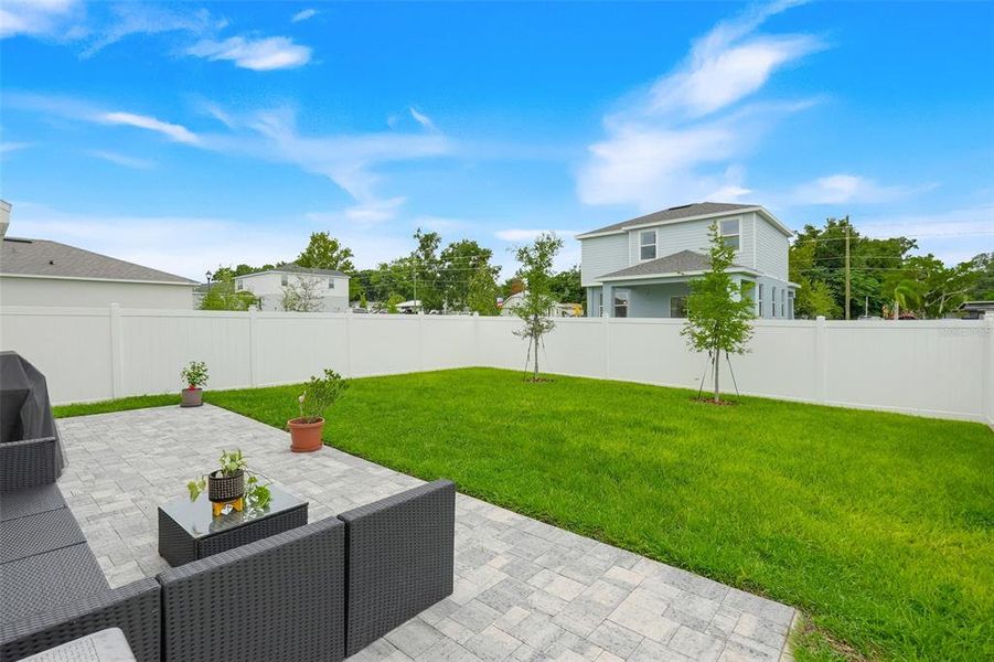 Exterior details and patio area of a home in Avalon Park Tavares, Tavares (Image 3). Exterior details and patio area of a home in Avalon Park Tavares, Tavares (Image 3).