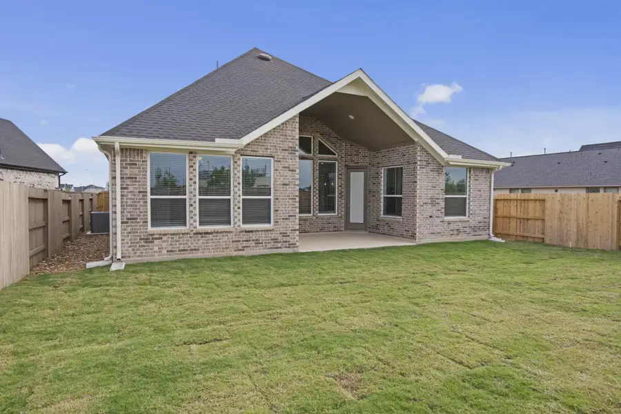 Exterior details and patio area of a home in Grange, Katy (Image 16).